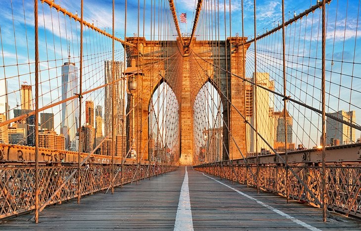 Take a stroll across the Brooklyn Bridge and soak in iconic views, historic architecture, and city energy.