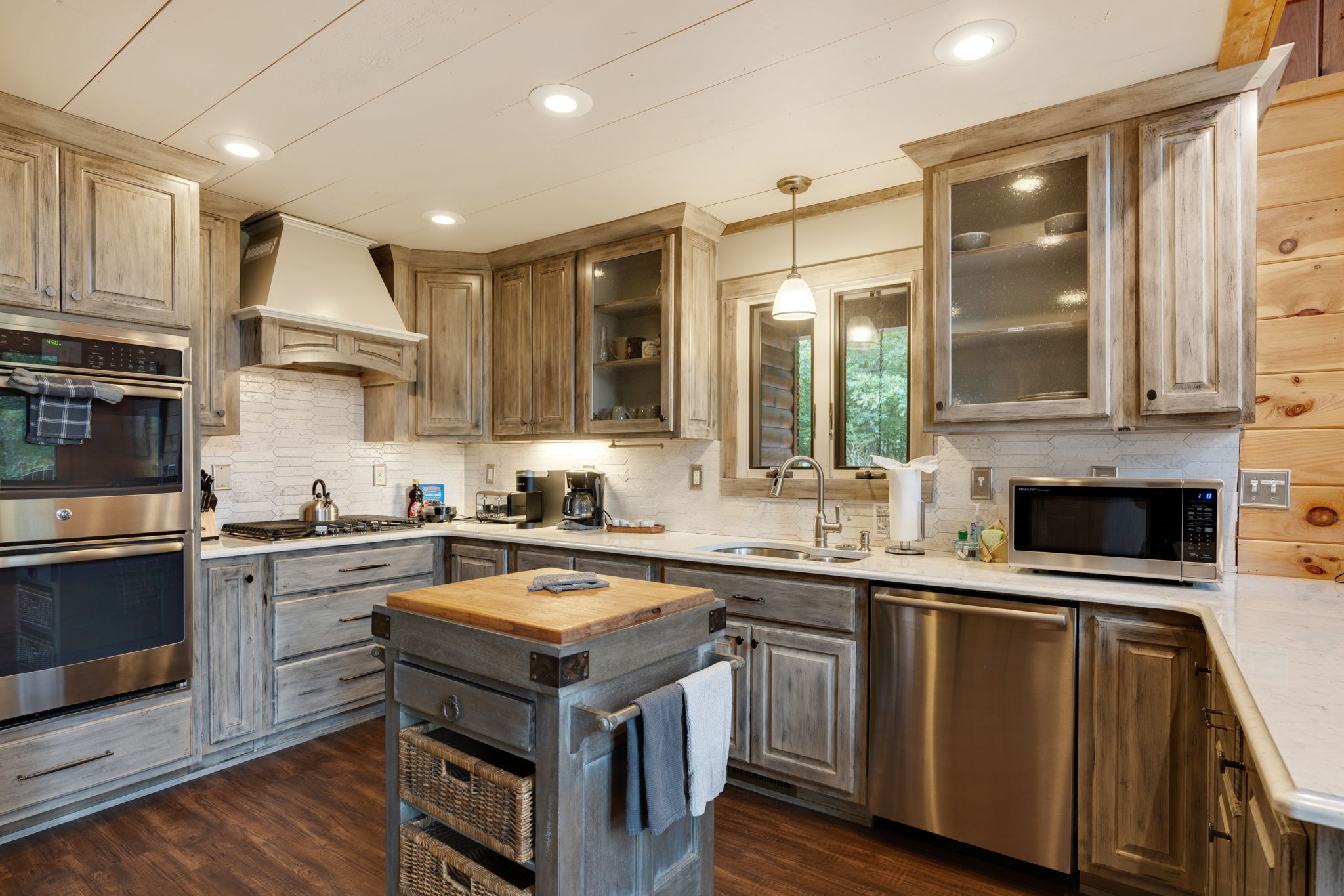 Beautful custom kitchen, stocked with applicance, pots, pans, utensils, etc., so you can cook for friends and family.
