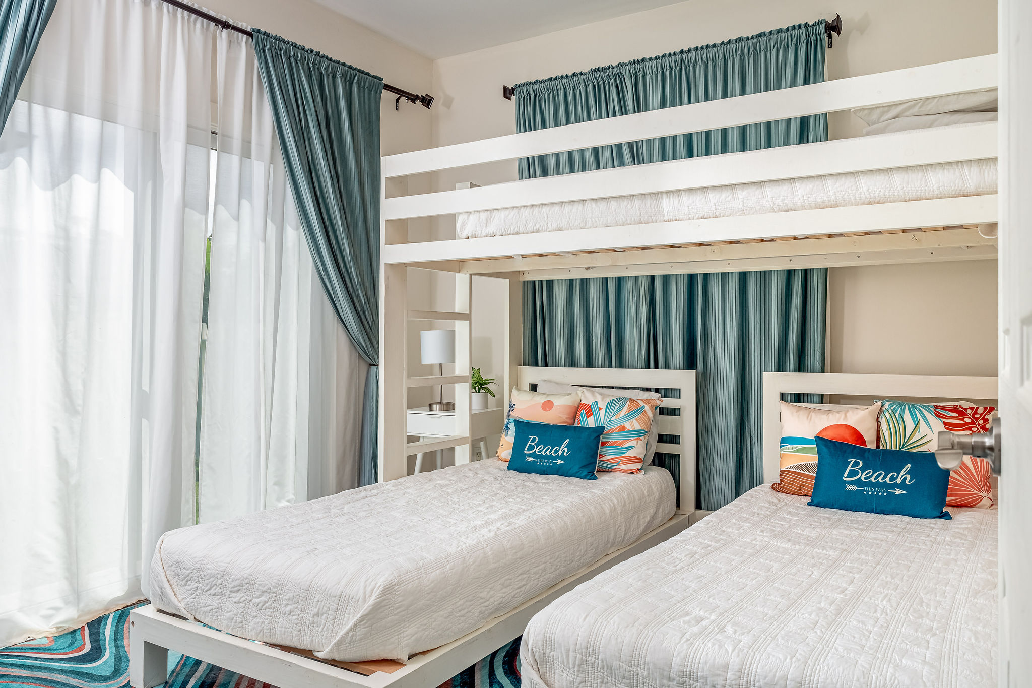 Twin XL (fits adults) over two Twin XL beds + AC