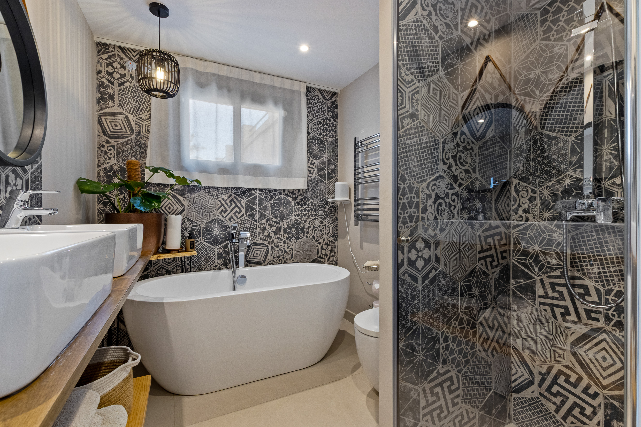 Spacious bathroom with freestanding tub and walk-in shower