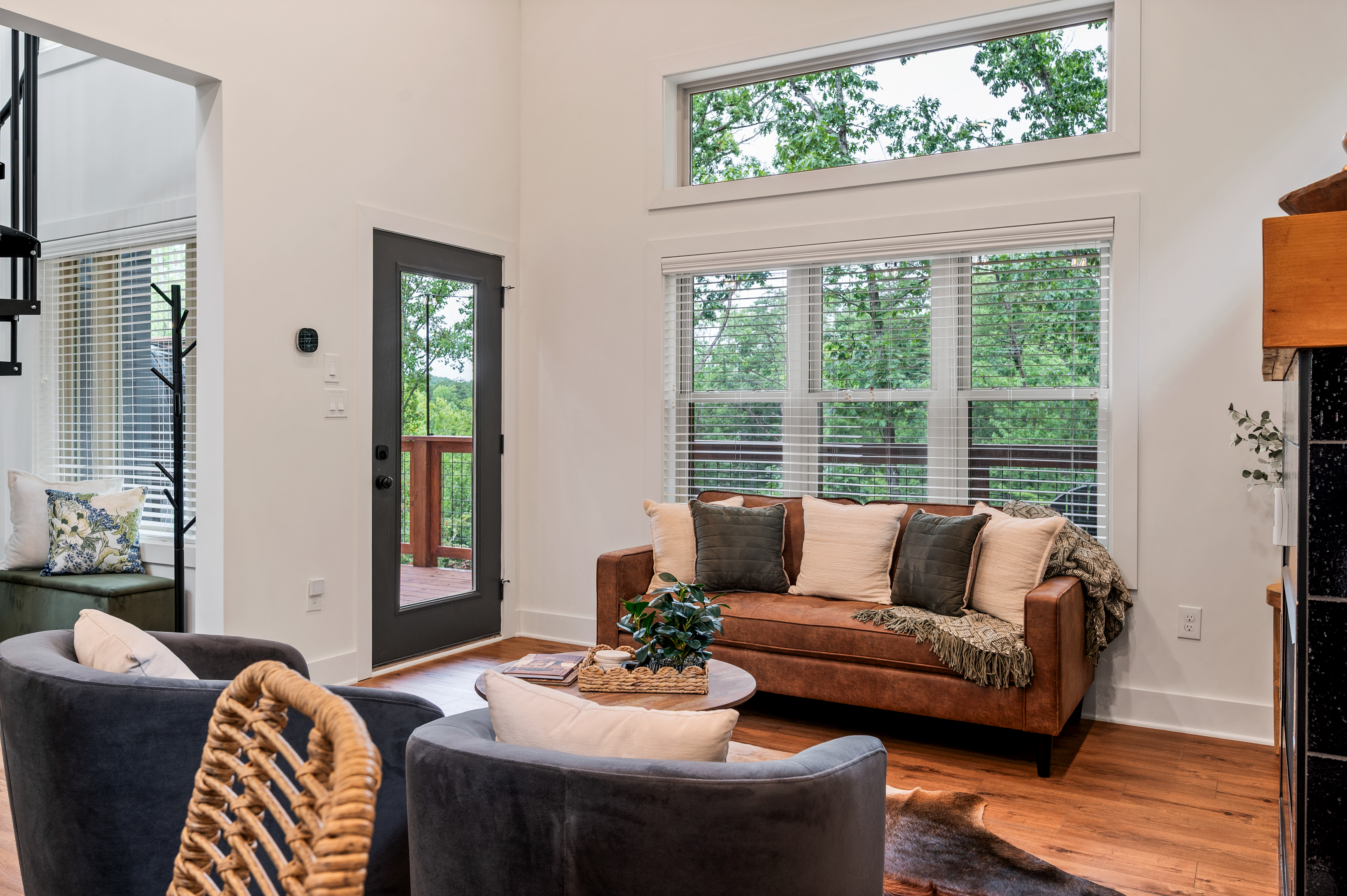 Relax in the living area, or escape out back to the balcony for some peace. 
