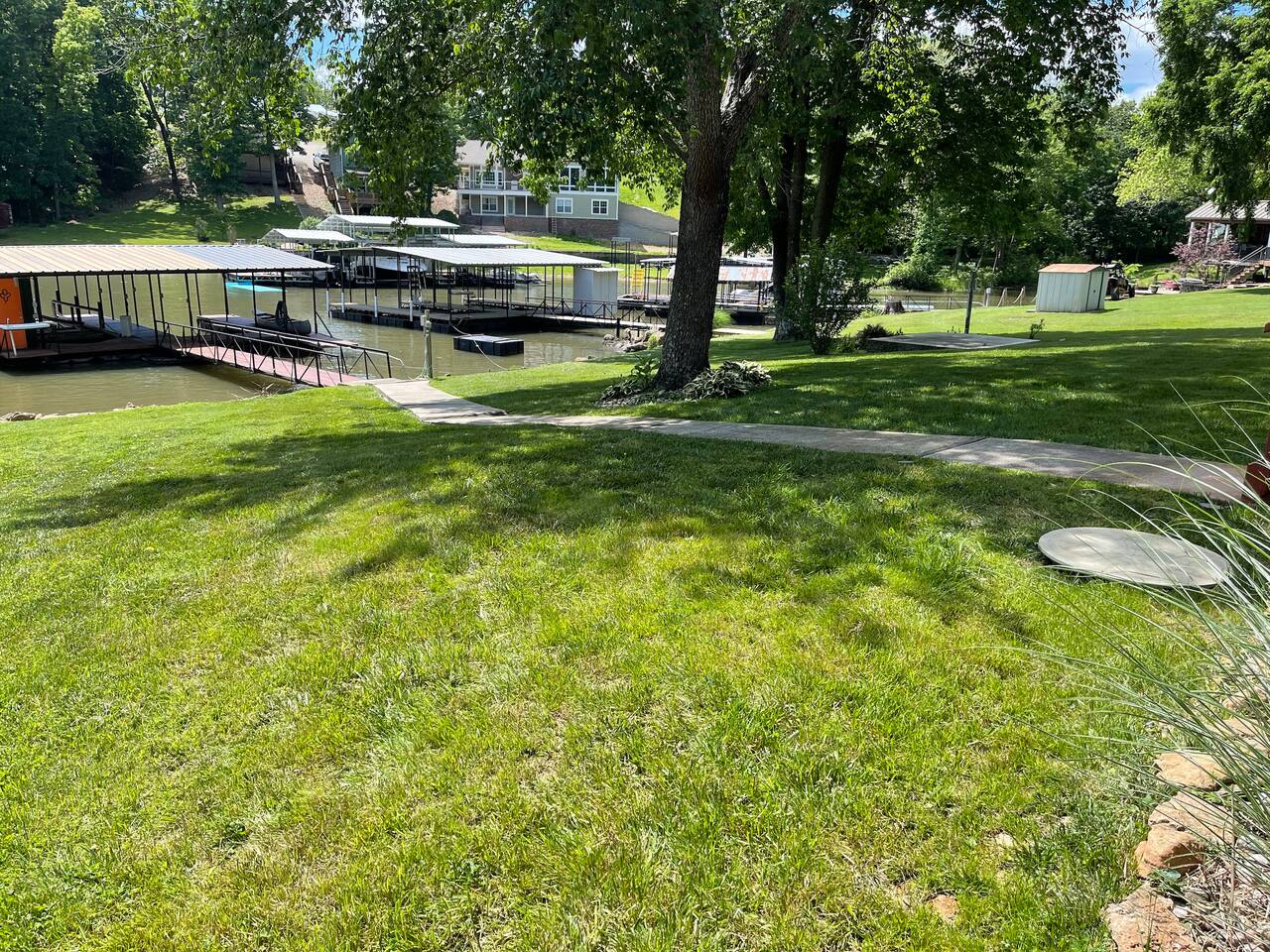 Nice concrete walkway from the house to the dock. 