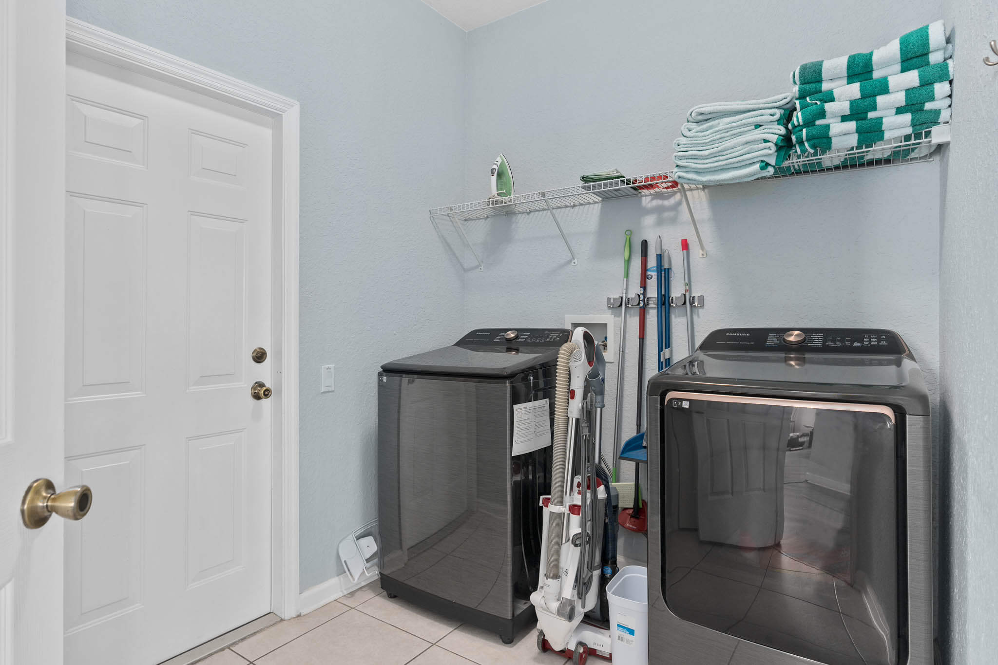 Laundry room with brand new washer and dryer
