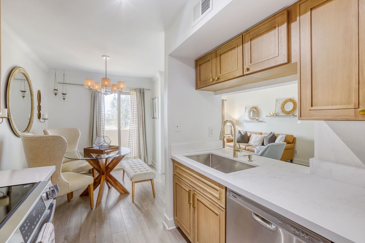 A well-stocked kitchen opens right into the dining and living space, keeping everyone in the conversation while you cook.
