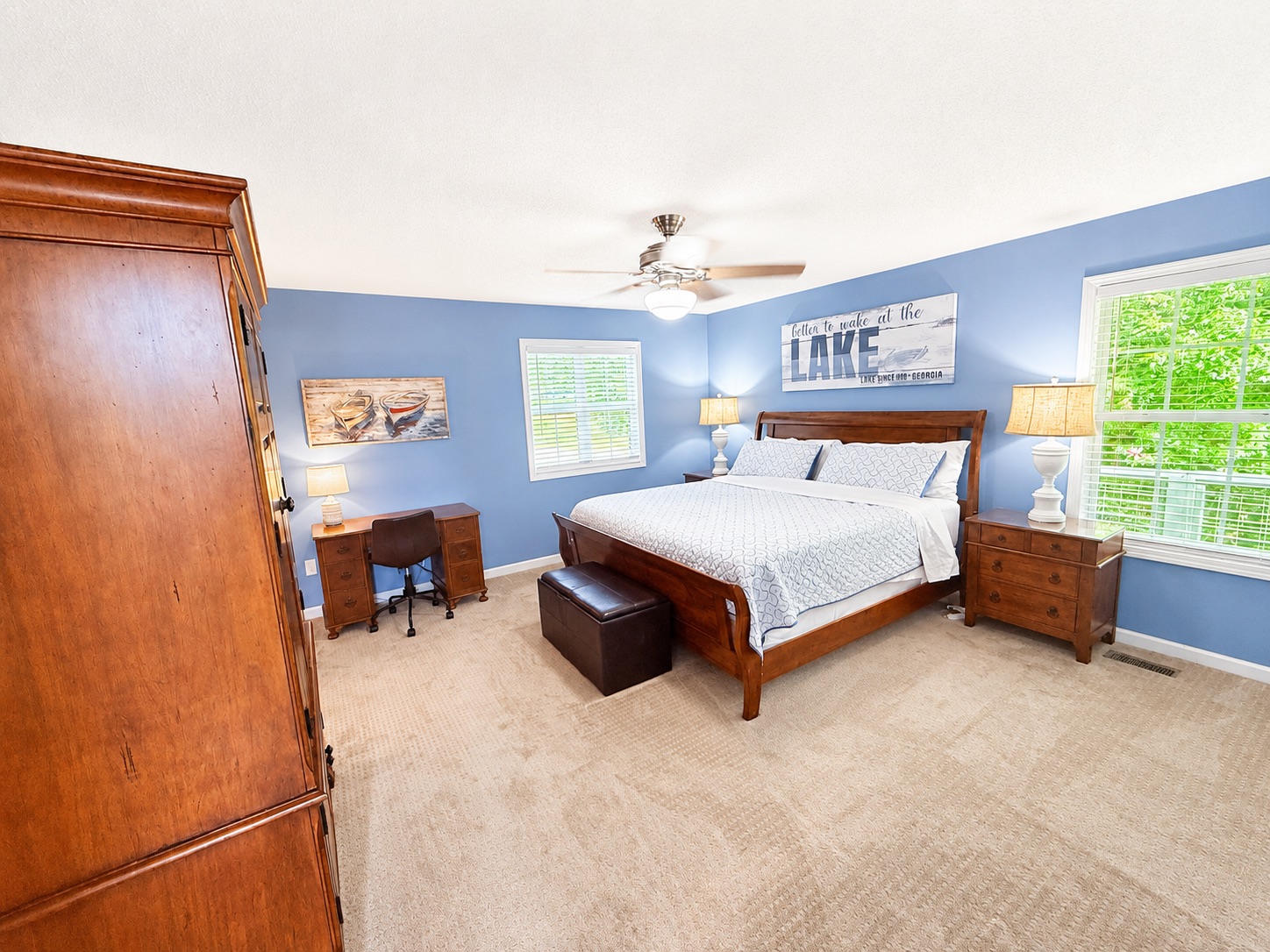 Bright master bedroom with cozy bedding
