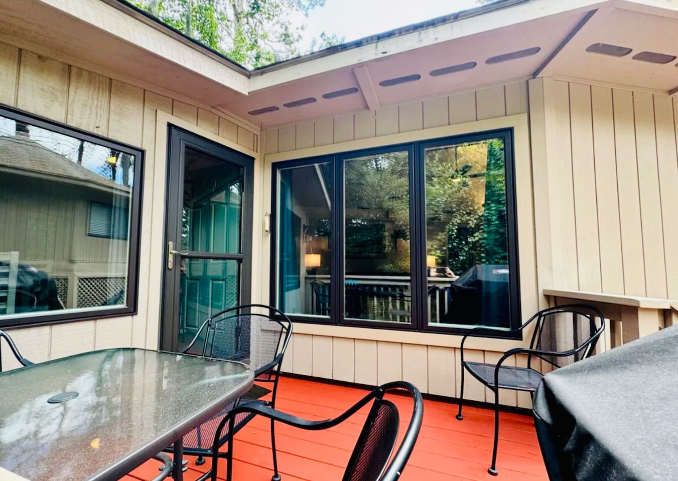 Screened porch with dining table