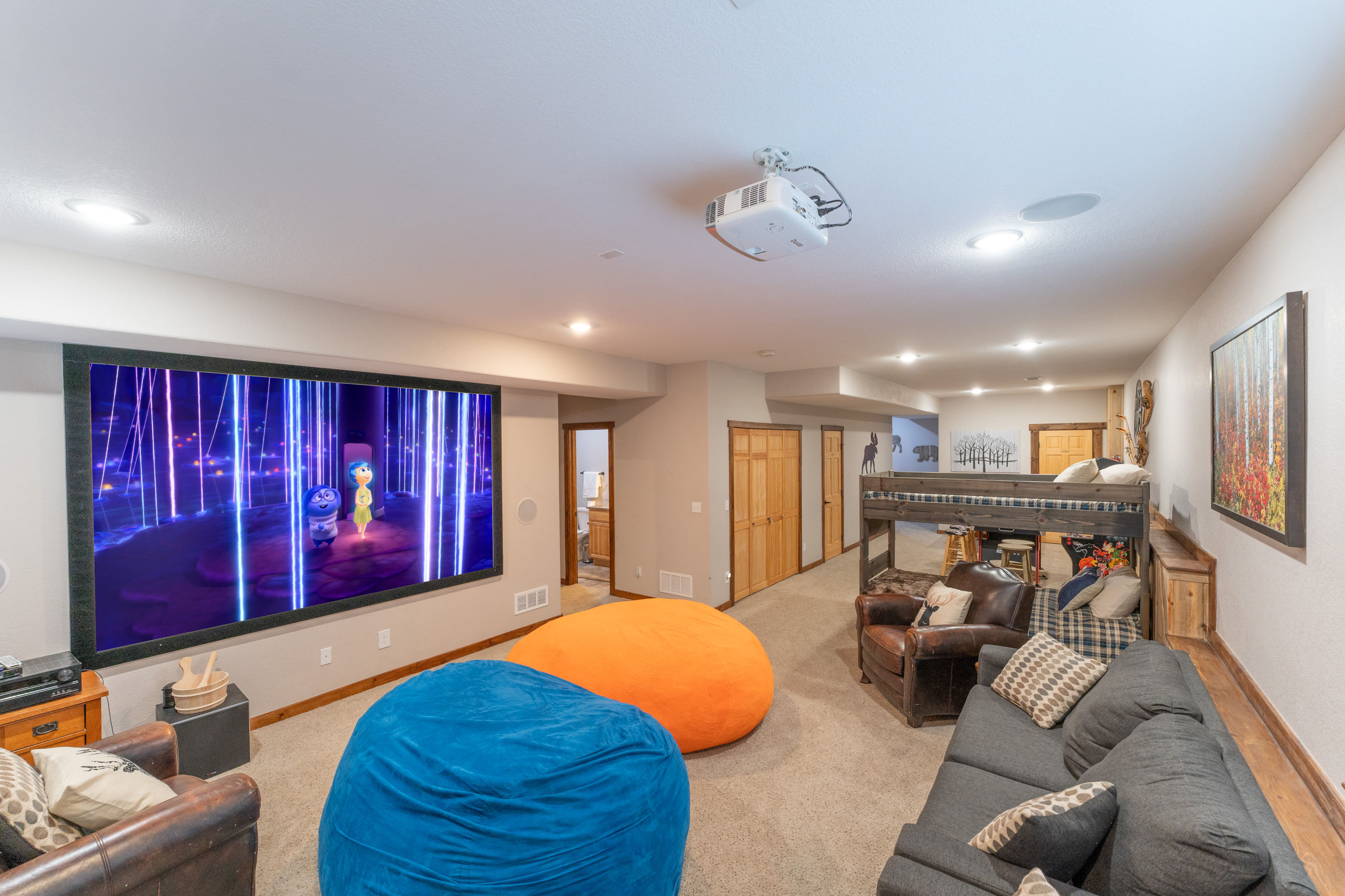 Relax in the evenings as you stream your favorite movies on the big screen. Twin bunk beds for the kids!