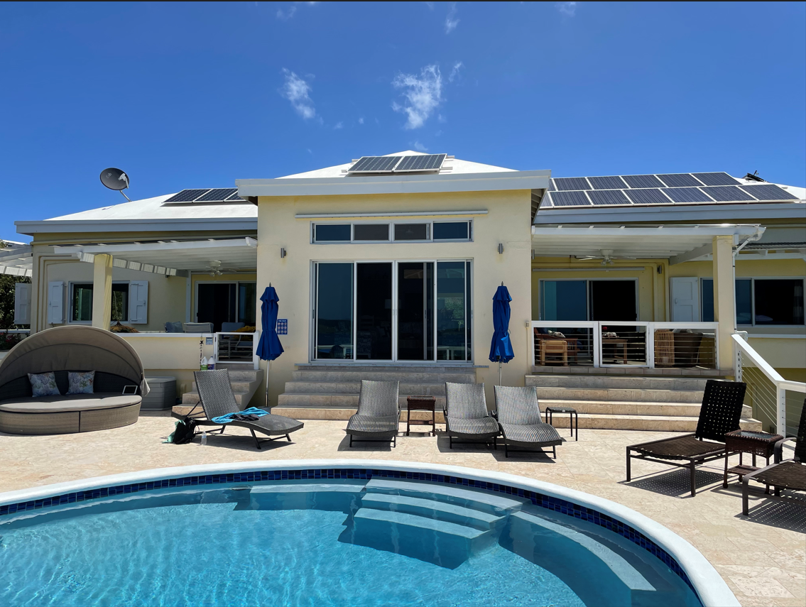 Relax next to the pool with a cool drink or book.
