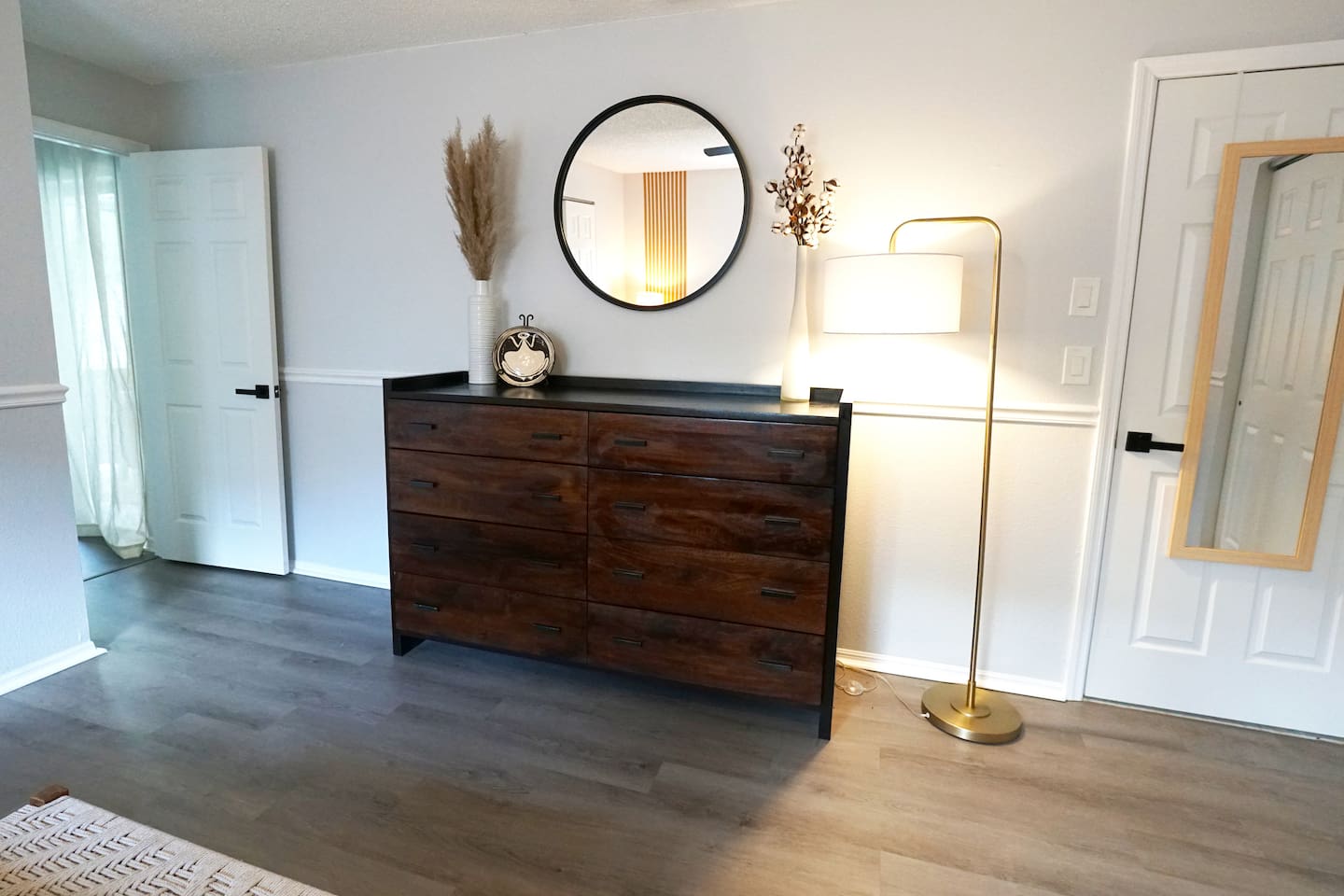 Plenty of space and storage in the master bedroom. Full length mirror as well as convenient usb outlet near the bedside.