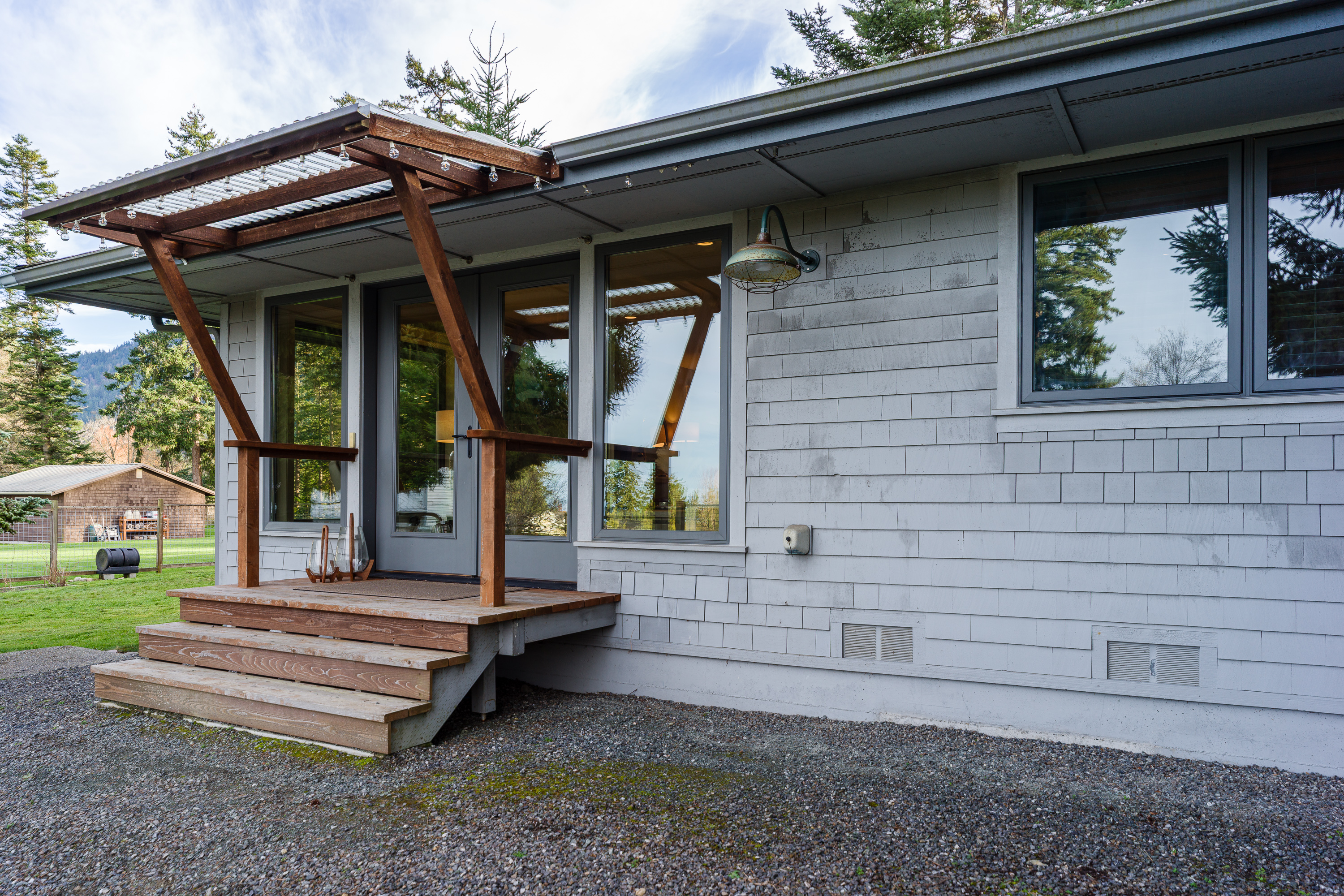 Easy access to patio and BBQ area are just a few steps down from the indoor space.