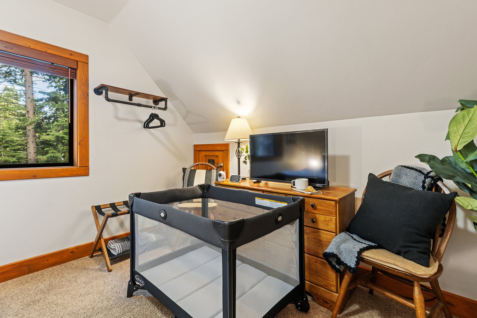 Bring the baby too — the Pack 'n Play's already set up, with a monitor and everything the littlest traveler needs.