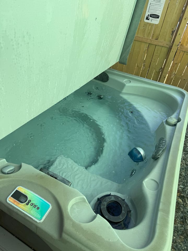Hot Tub Oasis: Unwind in the bubbling warmth of your private hot tub under the stars!