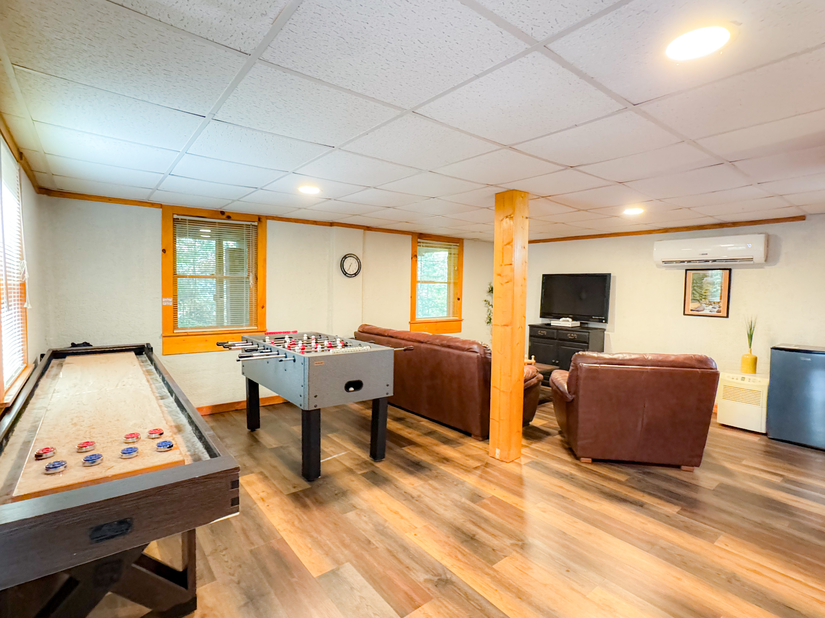 Lower level game room - foosball, shuffle board, table games, cards, Roku TV and more!