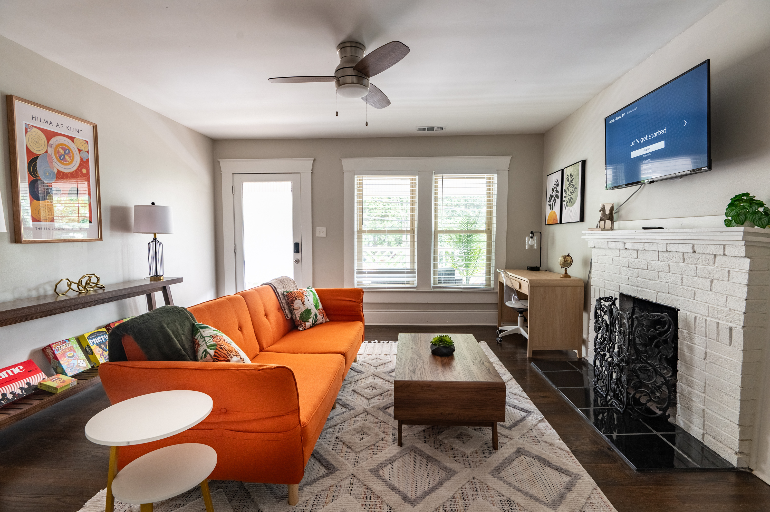 Relax in Comfort: Step into our cozy living room featuring ample seating and a smart TV. Perfect for unwinding after a day of exploring.