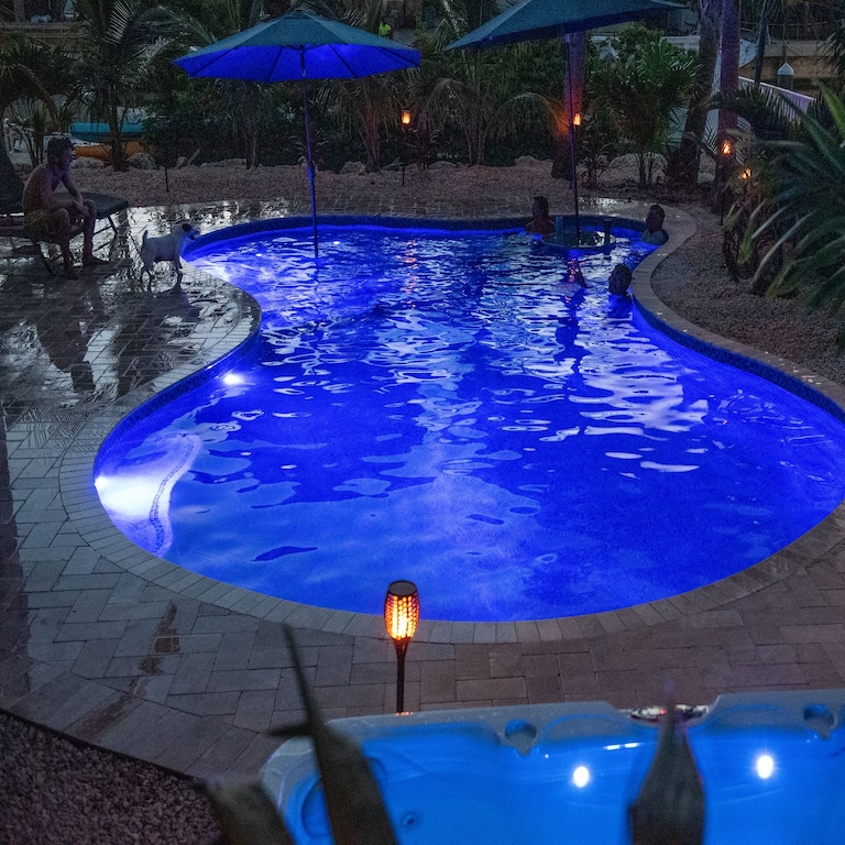 Enjoy the large custom pool at night