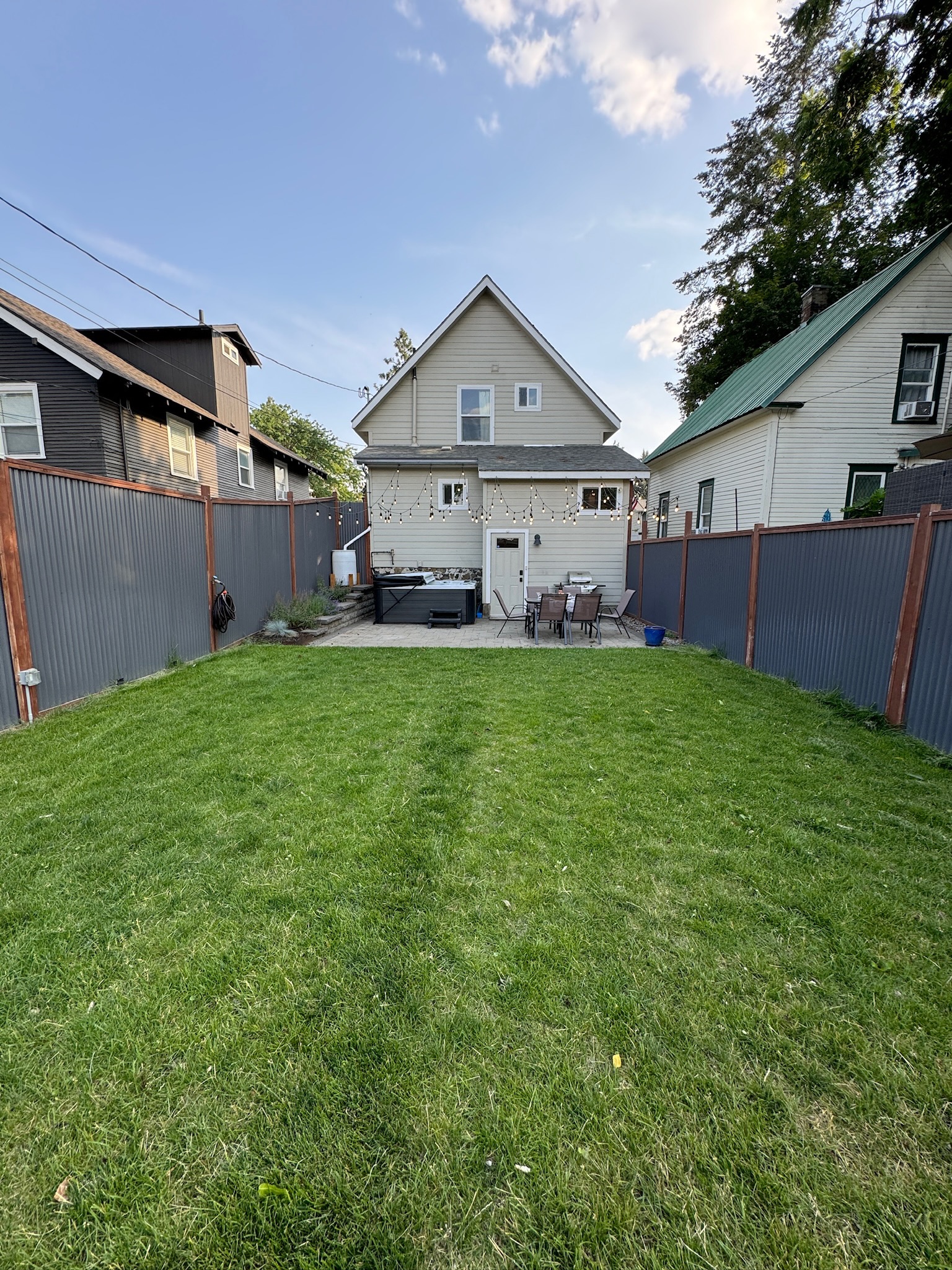 Enjoy dining outdoors on the patio in the fully fenced backyard. Then soak in the hot tub for maximum relaxation!