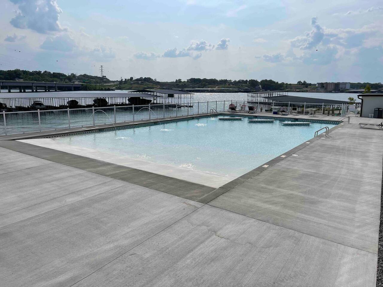 Resort style pool is open! Fountains, beach entry, gorgeous views of the lake, and more. 