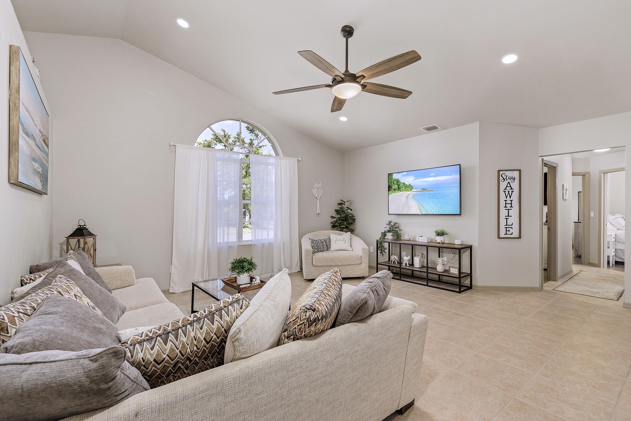 One of 2 Living Rooms