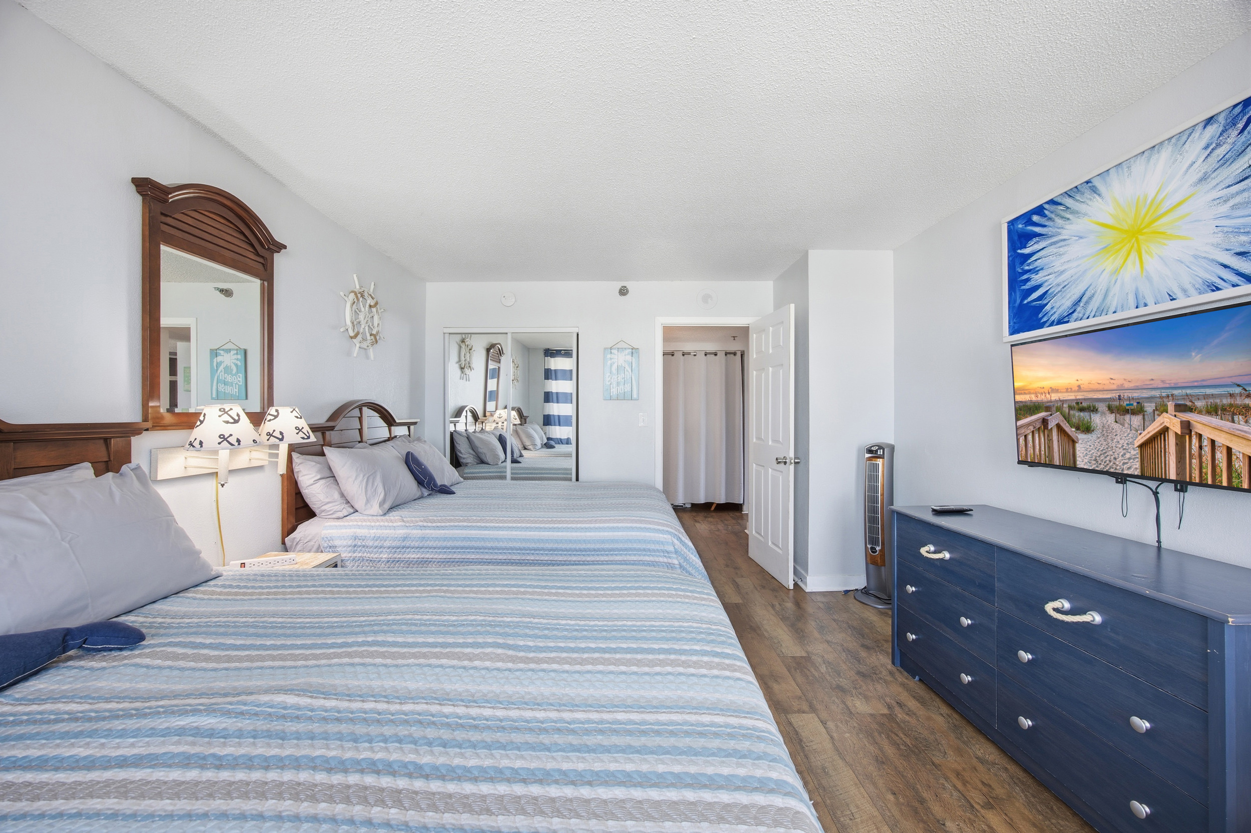 Bedroom sleeps 4. Queen size beds.