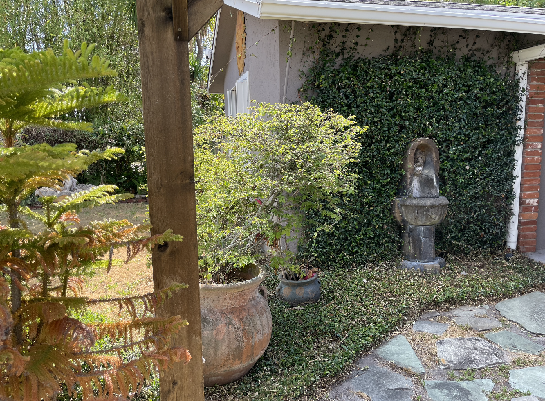 Enjoy time outside under the pergola, surrounded by a garden and fountains.