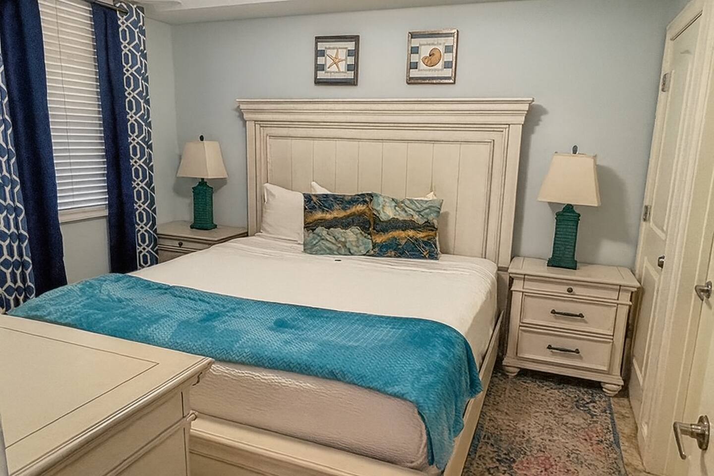 A charming guest bedroom that gives everyone their own comfortable place to recharge.
