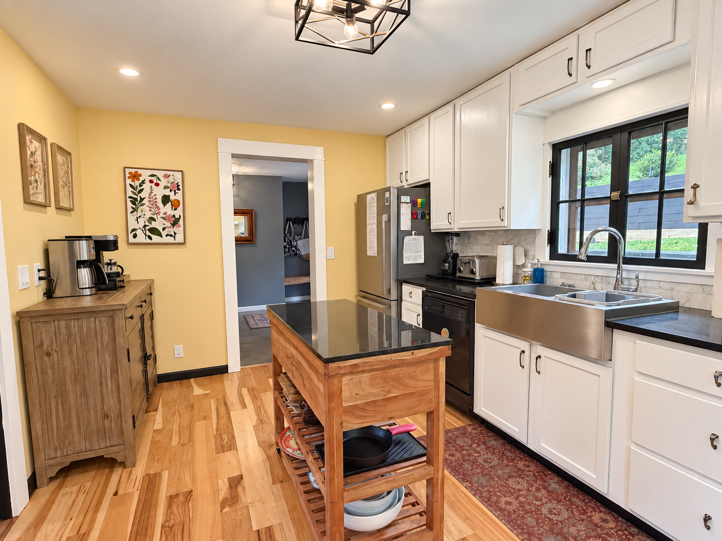 The galley kitchen is fully equipped with high end amenities
