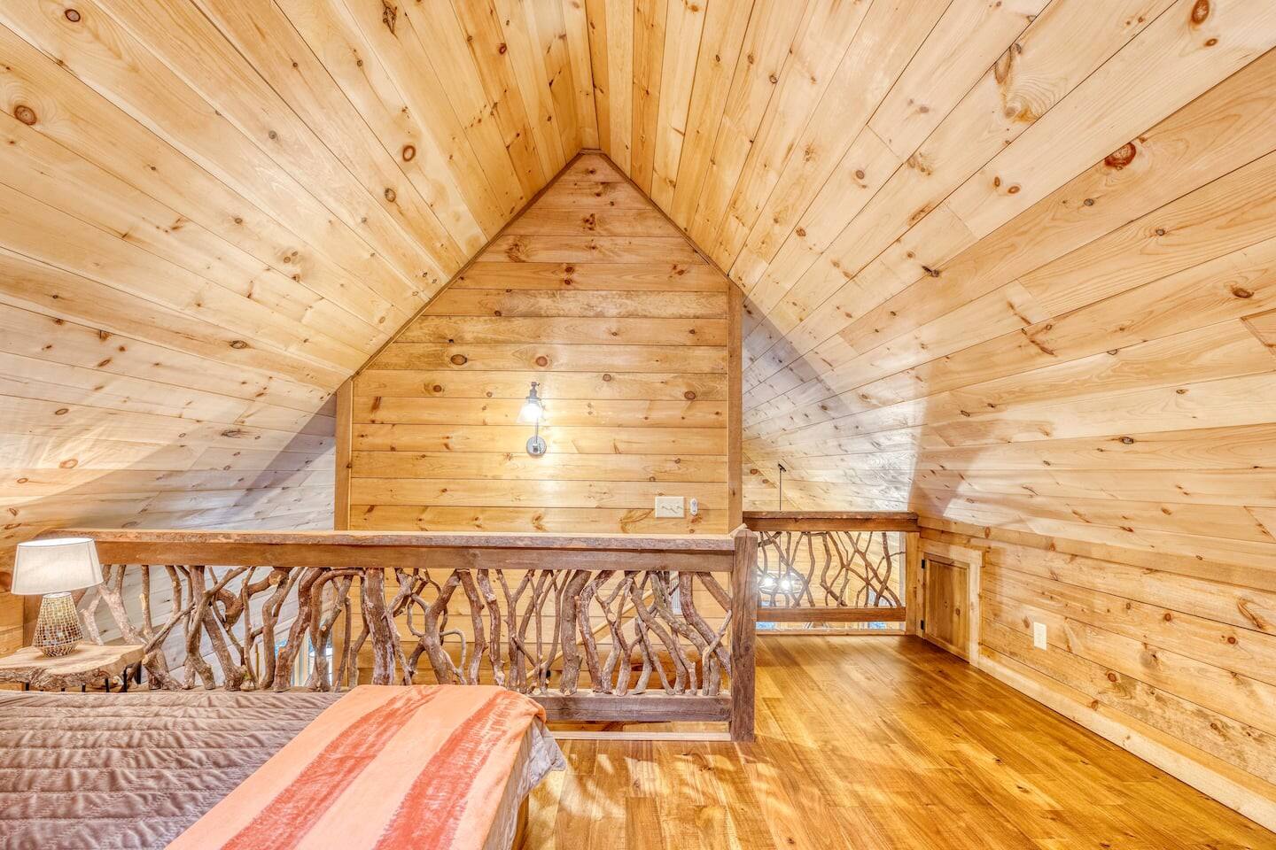 Our loft space boasts a cozy bed, offering a peaceful retreat high above the hustle and bustle below. 