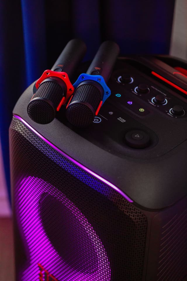 Get ready to belt out your favorite tunes with our karaoke setup!  Perfect for family and friends looking to create lasting memories, this setup offers hours of entertainment with crystal-clear sound and vibrant lights. 