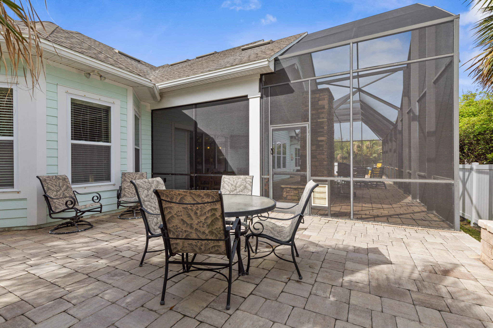 Linger over dinner on the patio, wander from the table to the pool, and let the evening stretch under the screened lanai—warm breezes, easy laughter, and that peaceful feeling of having nowhere to be but right here.