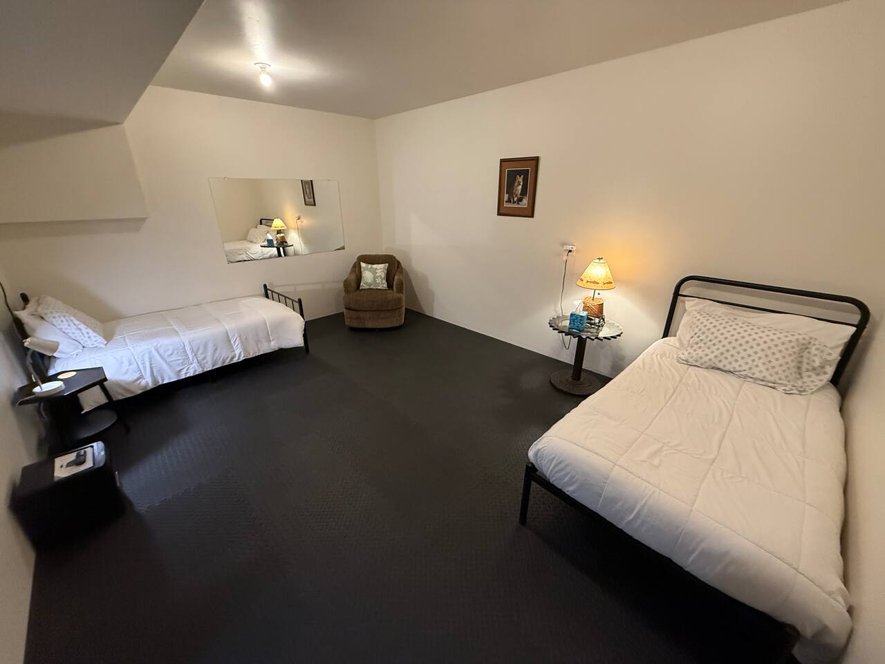 basement bedroom with two twin beds (no closet)
