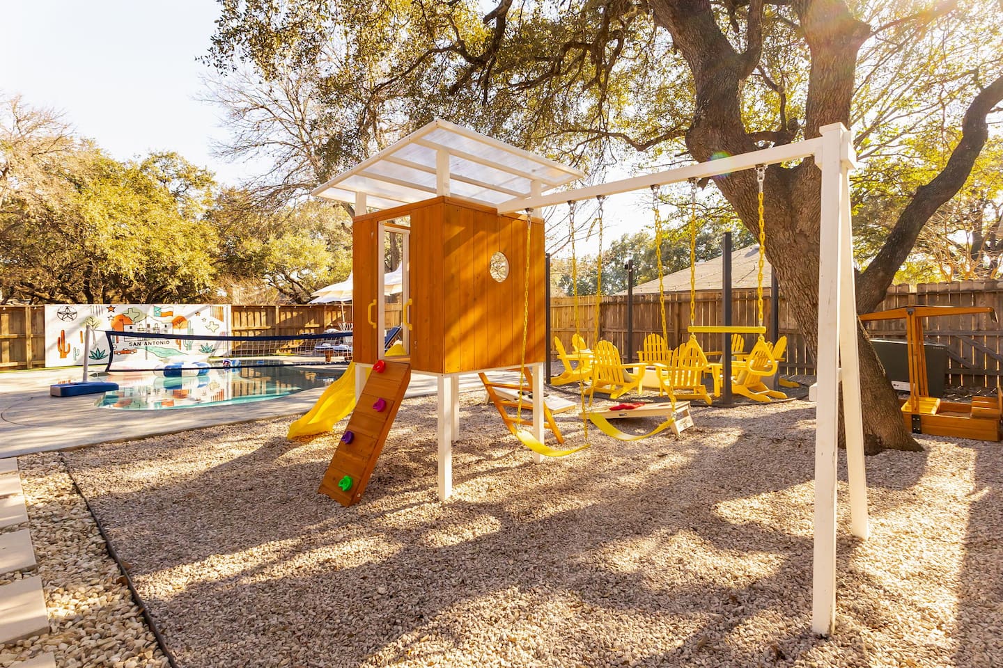 A backyard paradise for all ages!  Whether it's swinging, sliding, swimming, or soaking up the sun, there’s something for everyone to enjoy.