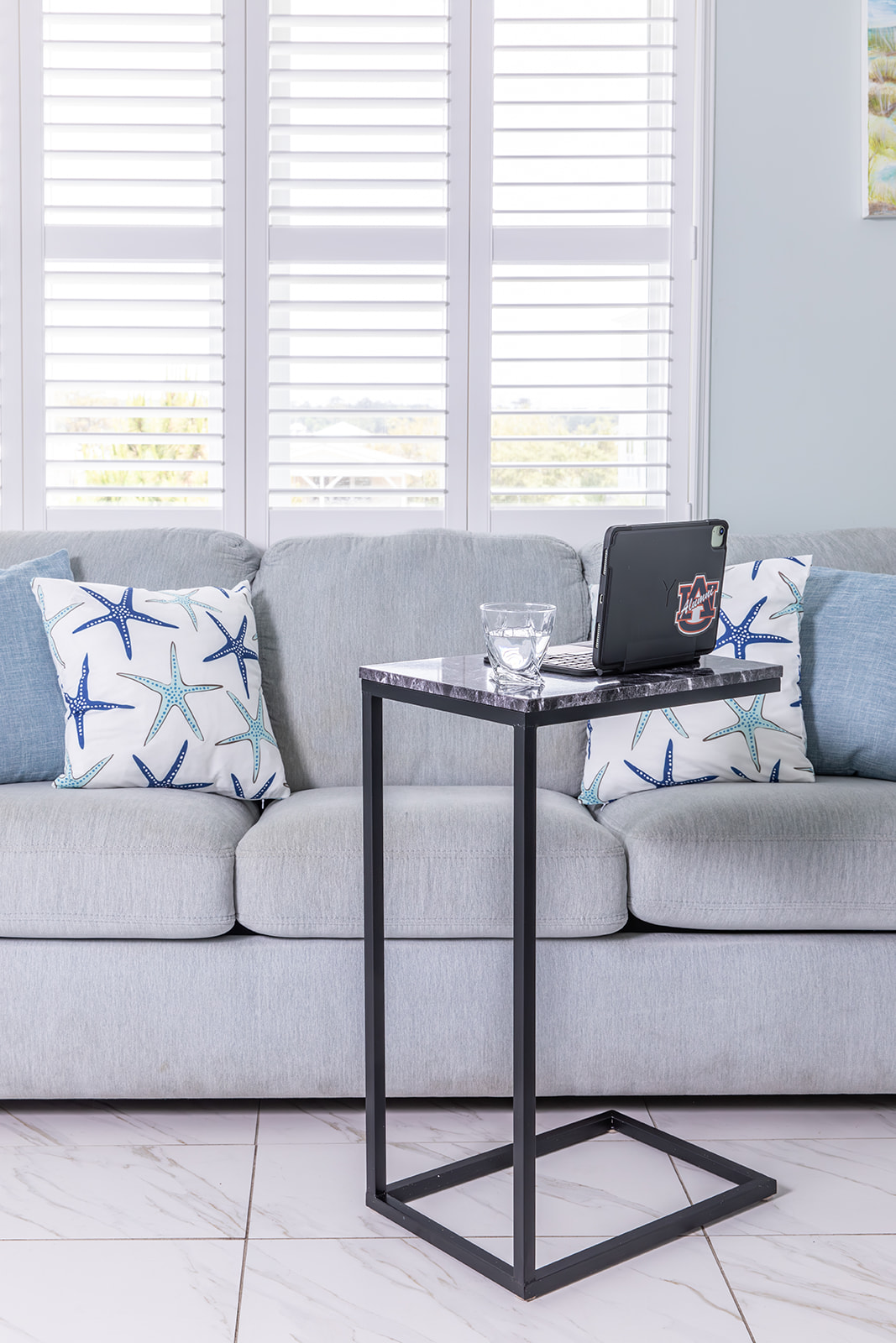 Sofa tables provide a comfortable spot for tablet or computer use while watching TV, making it easy to catch up on work or plan the day without leaving the living area.