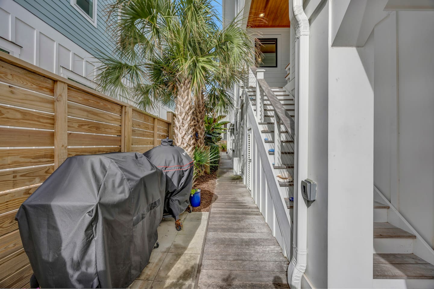 Steps to entry door - to the left of garage.
