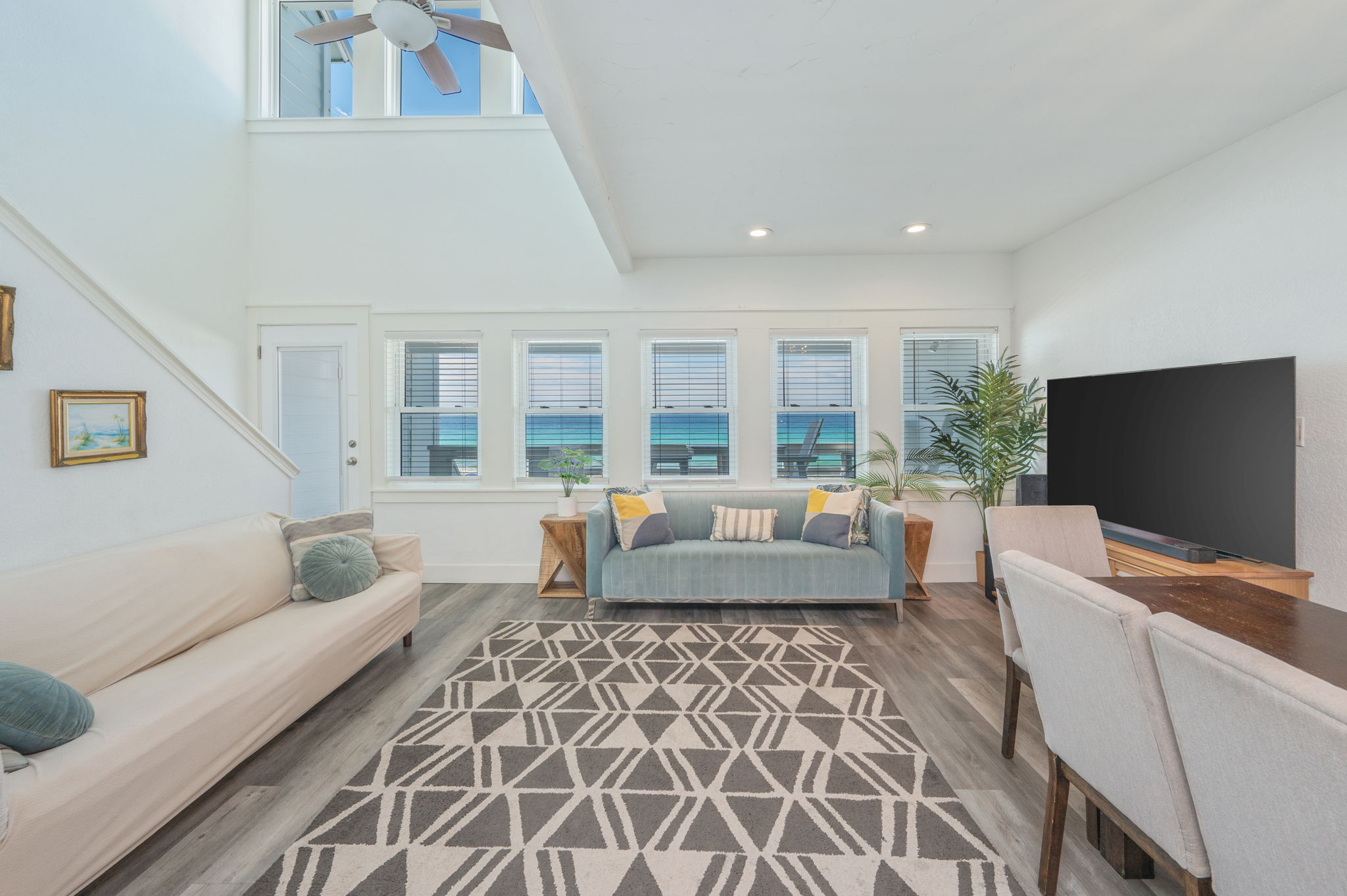 SeaWinds 8 - 2nd Floor has the Primary Living Space featuring Gulf Views, All New Leather Furniture, a 75" Smart TV, Remodeled Kitchen, Dining Space, and access to the Gulf View Patio.