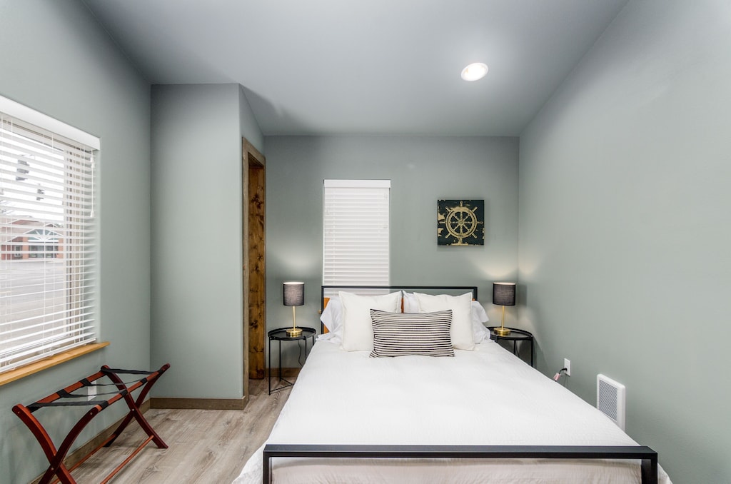 Front bedroom with premium green tea memory foam Queen bed.
