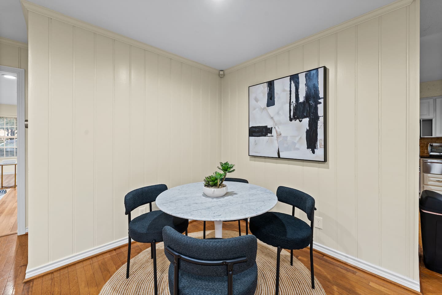 Cozy breakfast nook ideal for morning coffee or casual meals, tucked just off the kitchen for intimate dining.