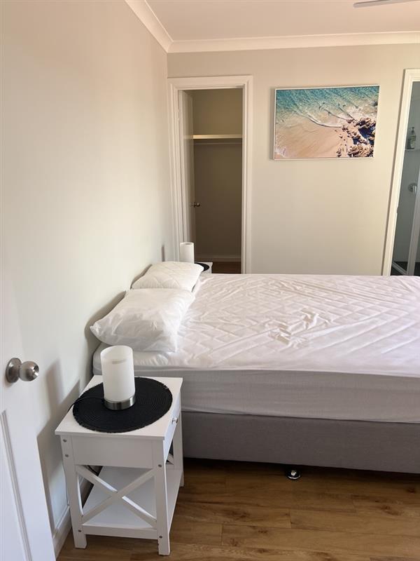 Main bedroom features Queen bed, ensuite & WIR
