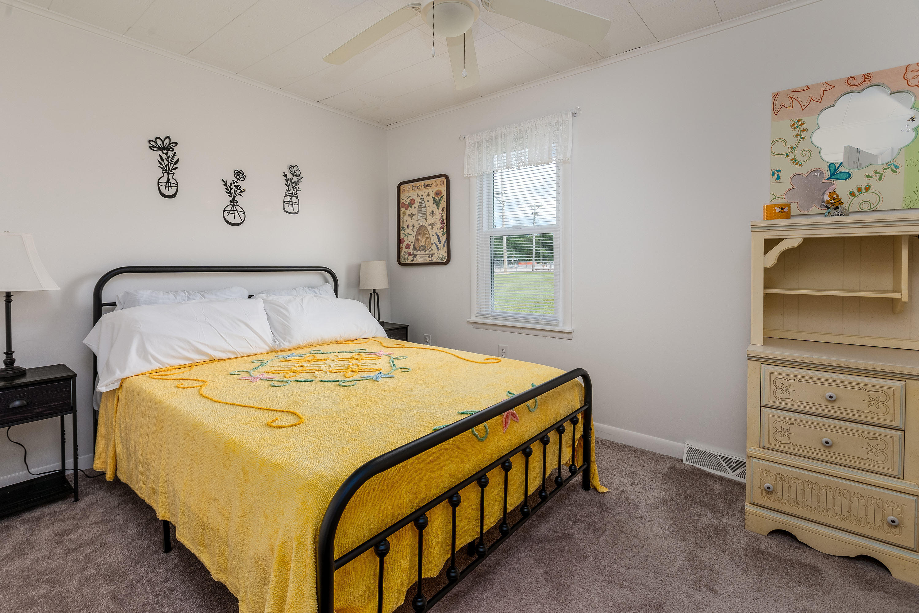 Bedroom 2: Queen bed, cozy lighting, and plenty of storage with closets and bookcases to make yourself at home.