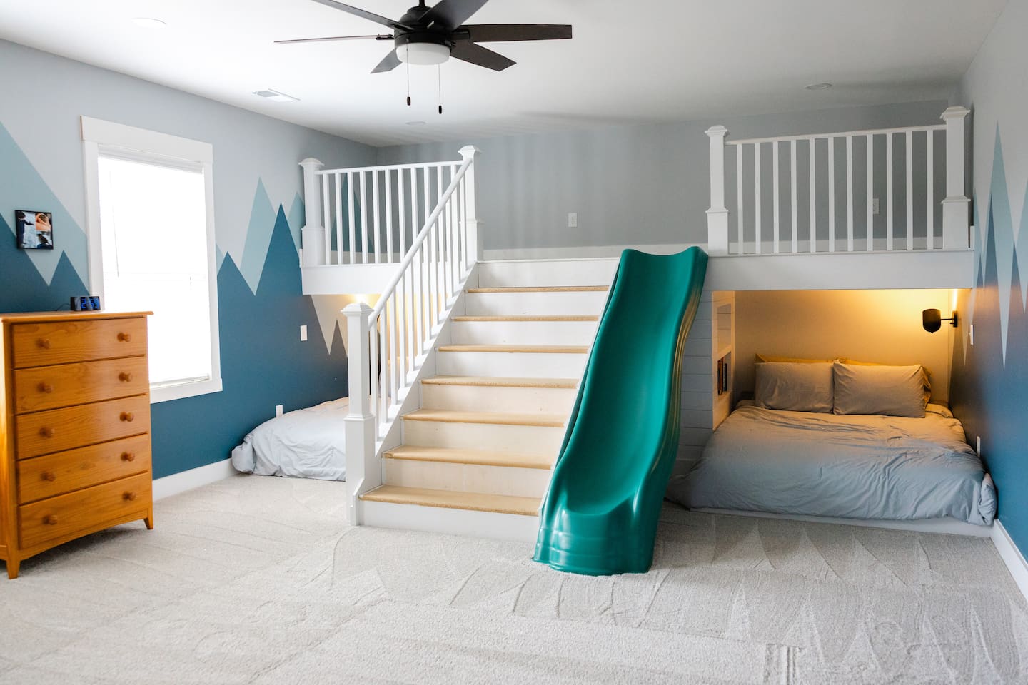 MASSIVE bedroom: 2 queen beds &  space to sleep on upper loft. Twin mattresses available upon request for additional beds. Plenty of space for pack n play (provided). Room has its own sink and shares private toilet and shower rooms with bedroom #3. 