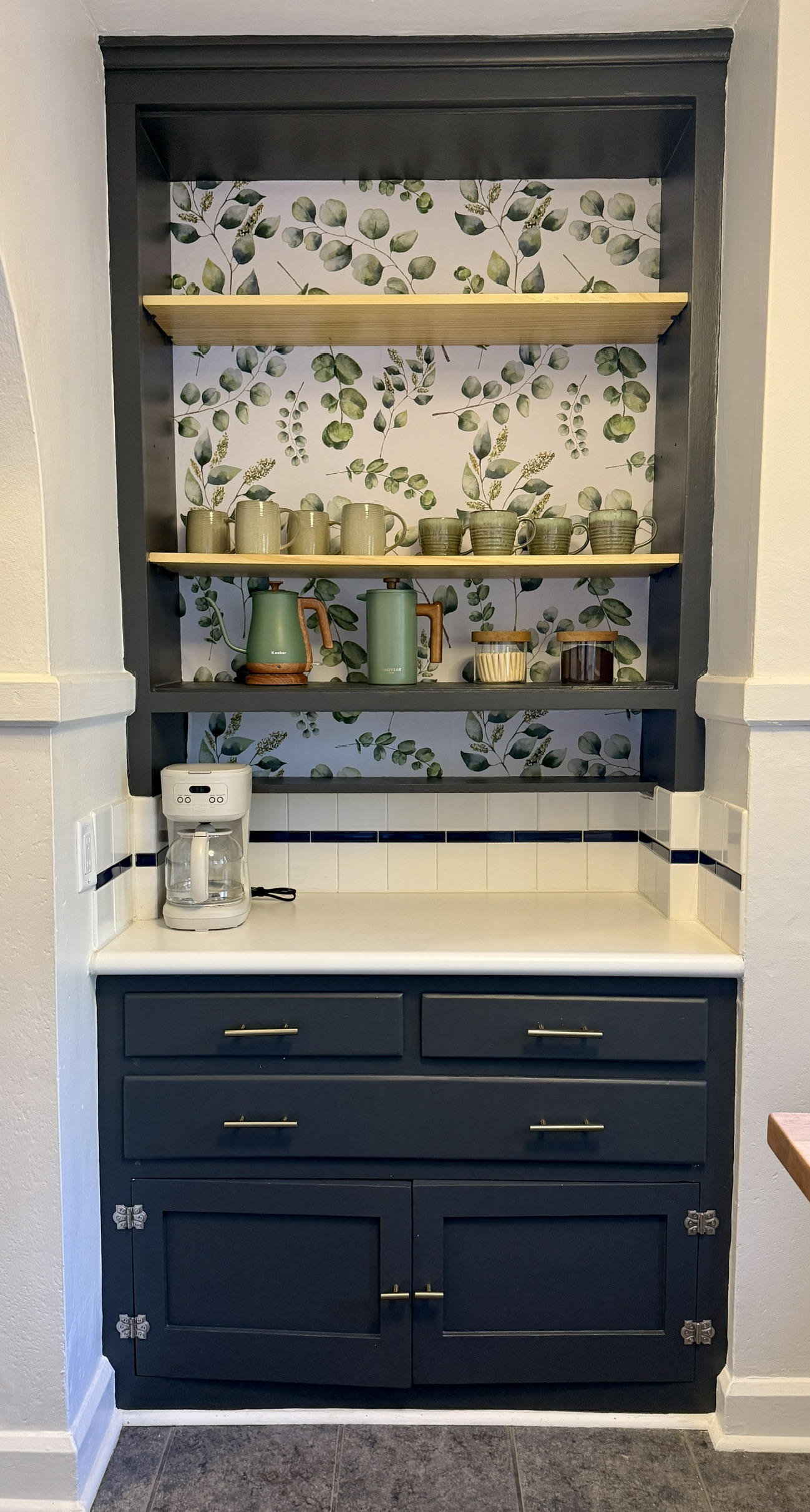 Dedicated coffee station for with coffee and tea provided.