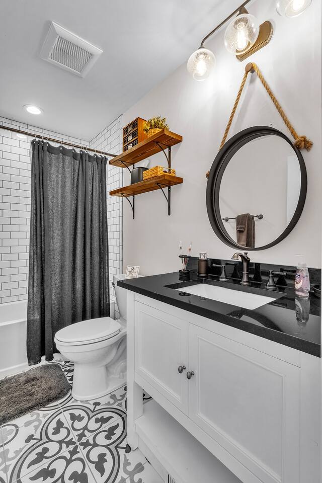 Full bath with tub/shower. Exquisite tile work. Modern and spacious design