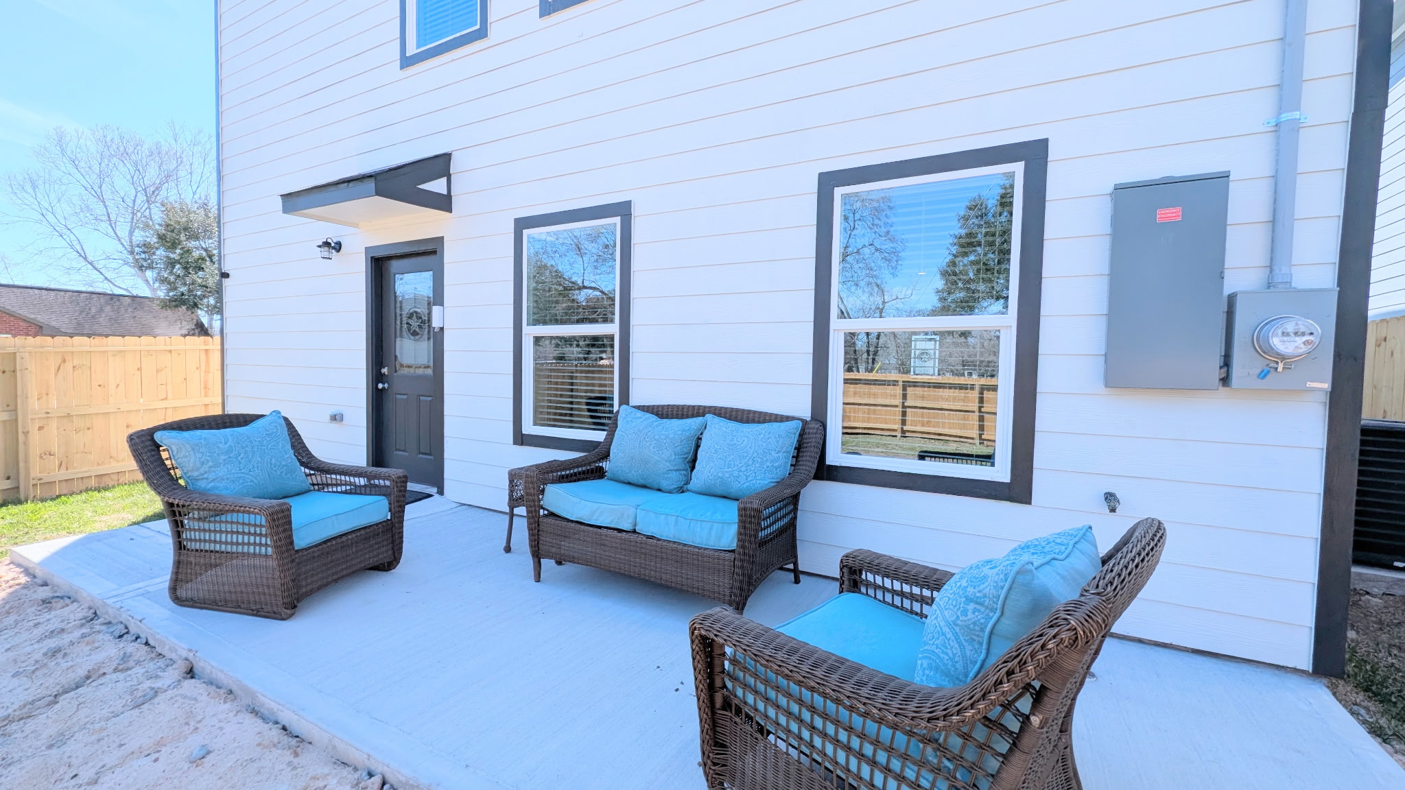 Relax on the spacious back patio with fully fenced yard.