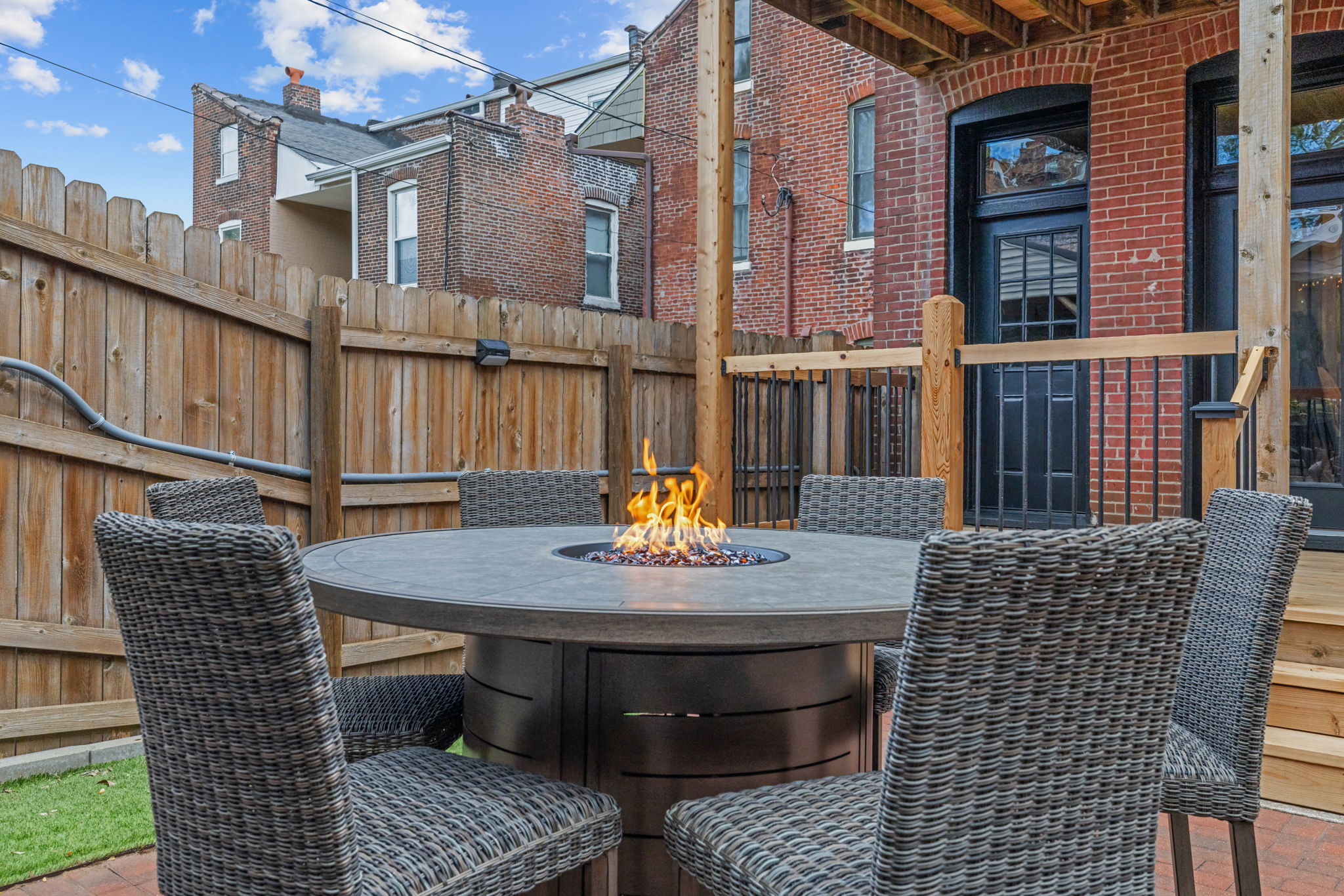 Share a meal around the outdoor dining table or gather round to keep warm with the center fire table feature.