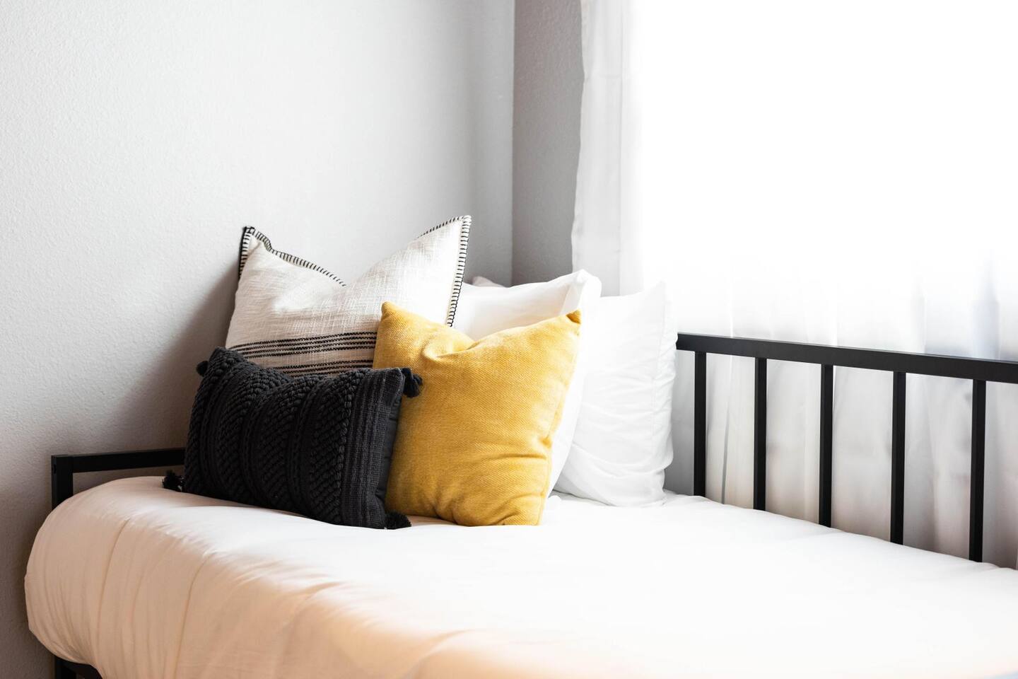 The twin bedroom’s cozy decor and soft bedding create a comfortable space for restful nights.