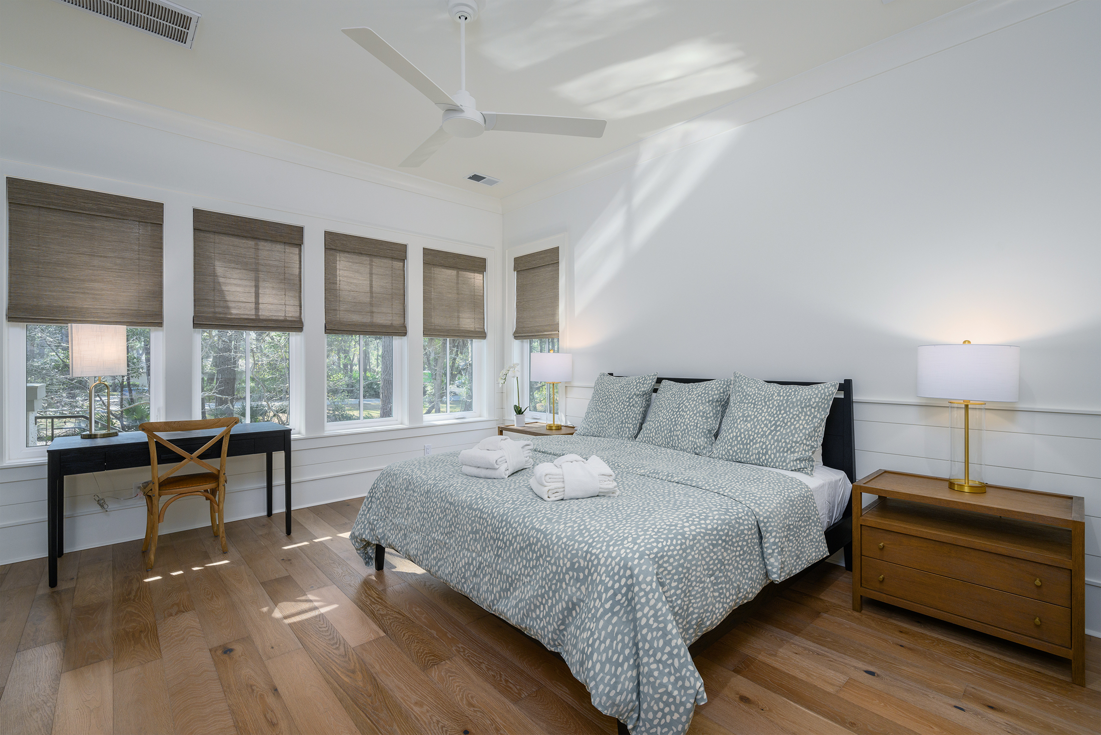 Master bedroom features king bed