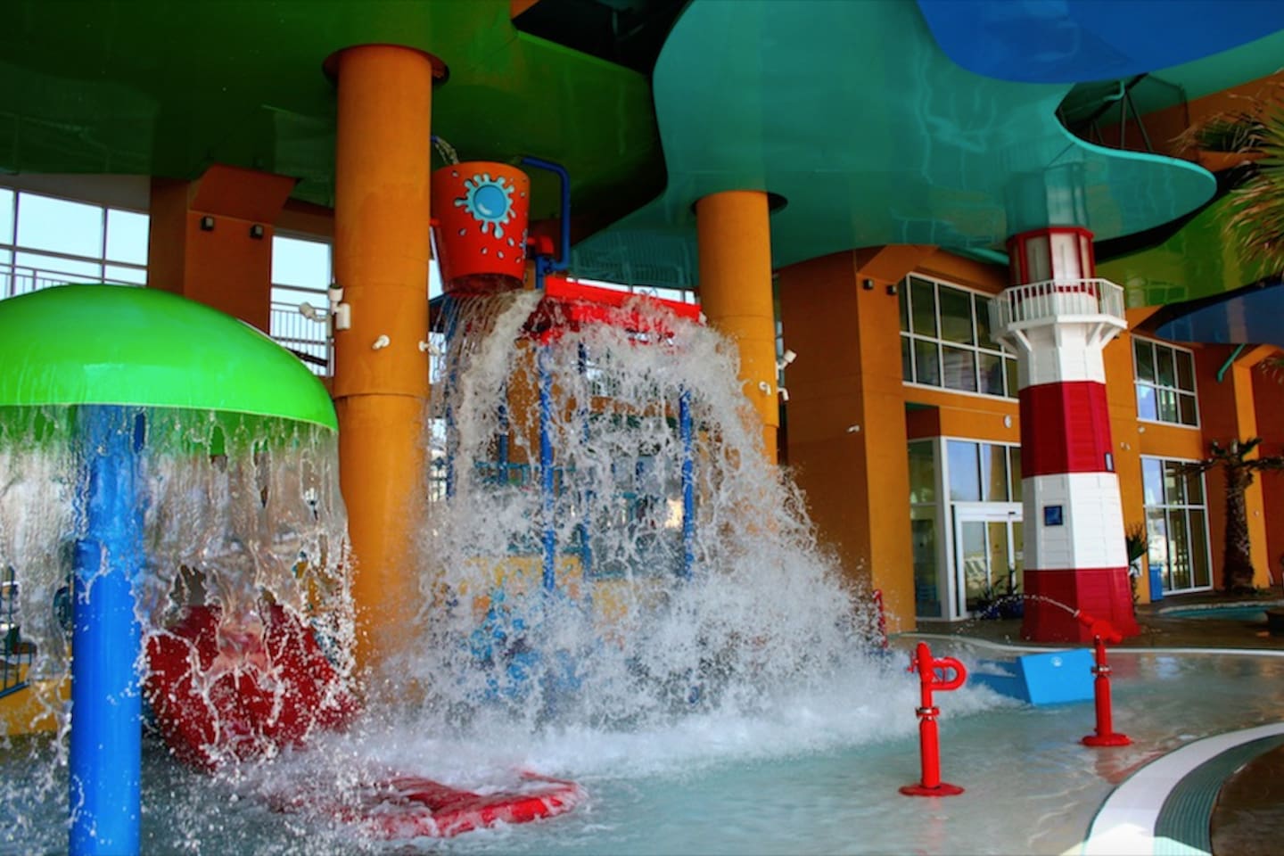 Wonderful fun with kid's water park area featuring slides, spray toys and water bucket!