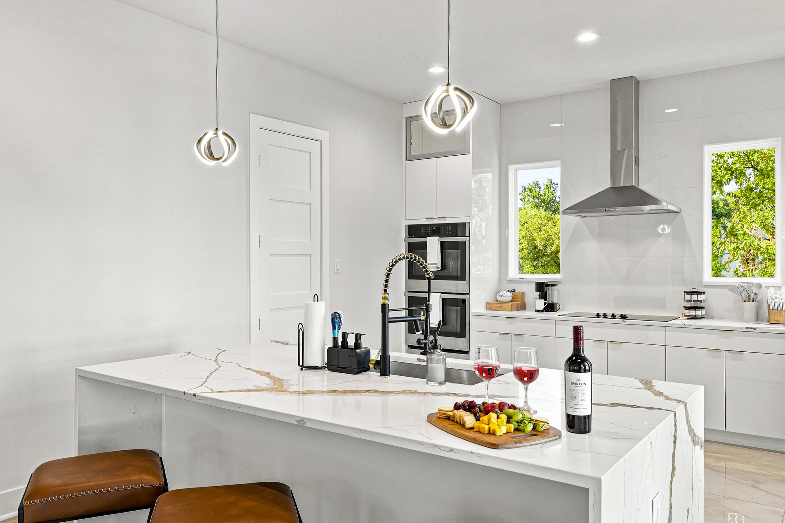 Whip up culinary delights with modern appliances and a gorgeous marble island!