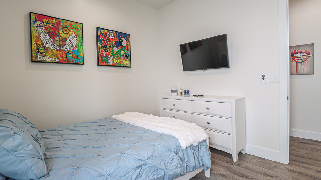 Queen Bedroom with Flat screen TV at Your Beach House