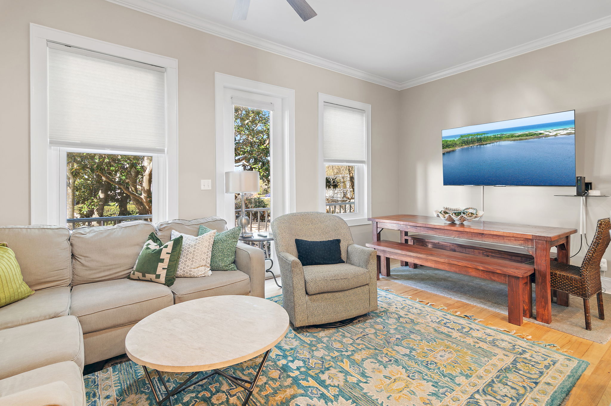 Comfortable living/ dining room open to kitchen with 75" TV