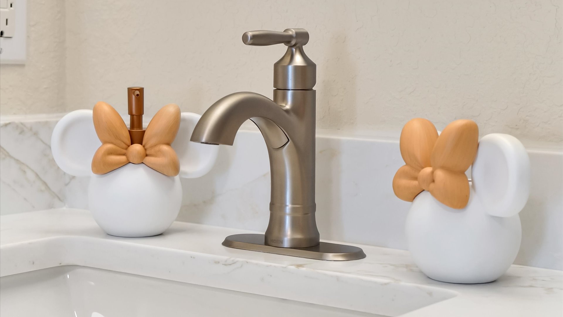 Mickey’s Rainbow Magic Bathroom – Playful Minnie-inspired accessories add a touch of Disney magic